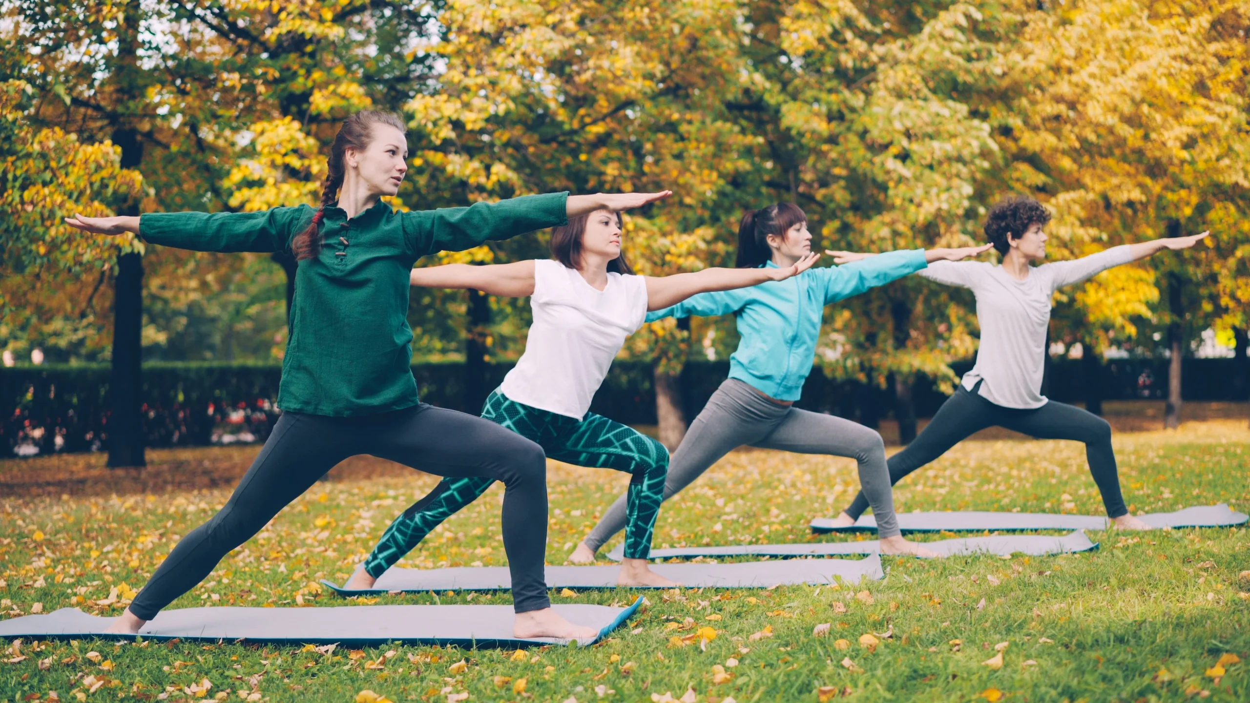 Beginners practicing yoga in a peaceful Ubud Bali yoga studio